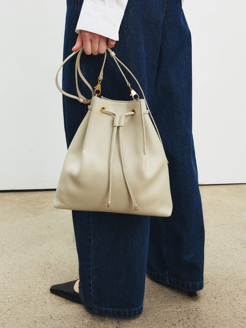 SELENA BUCKET BAG STONE