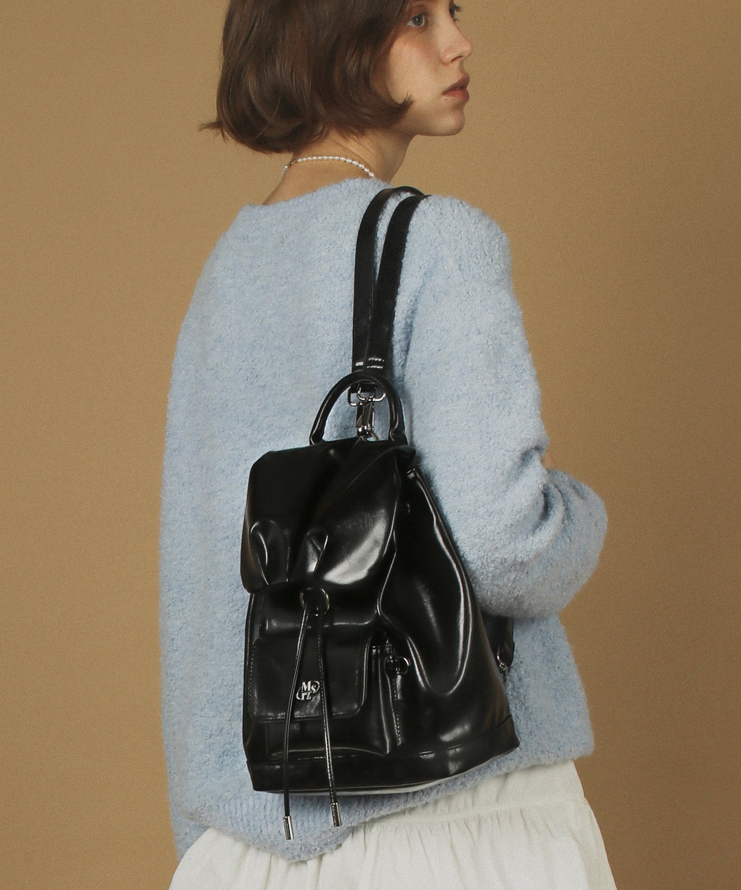 LEATHER SHIRRING MINI FLAP BACKPACK