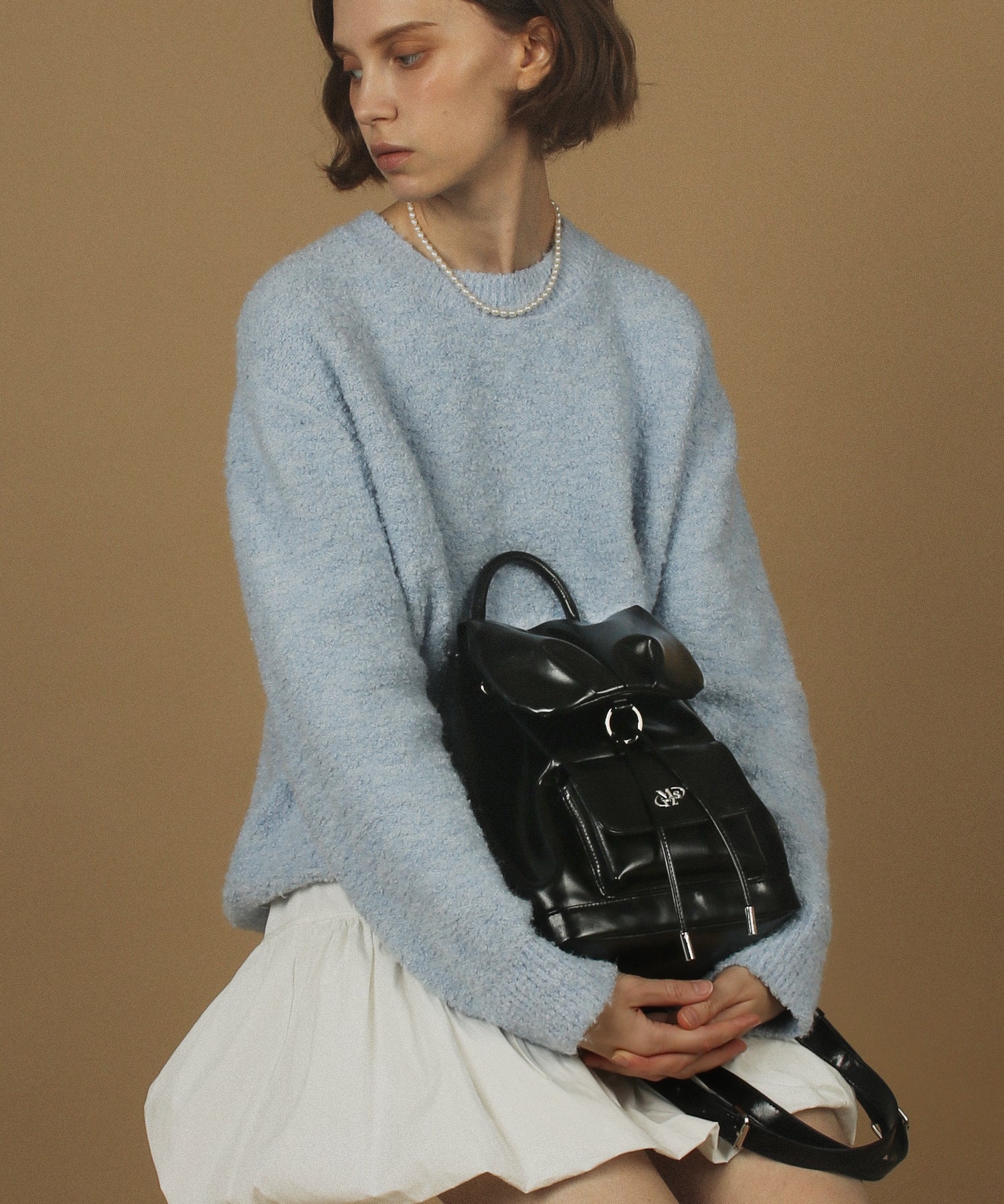 LEATHER SHIRRING MINI FLAP BACKPACK